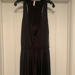 Robbi and Nikki black dress with piettes. Size L